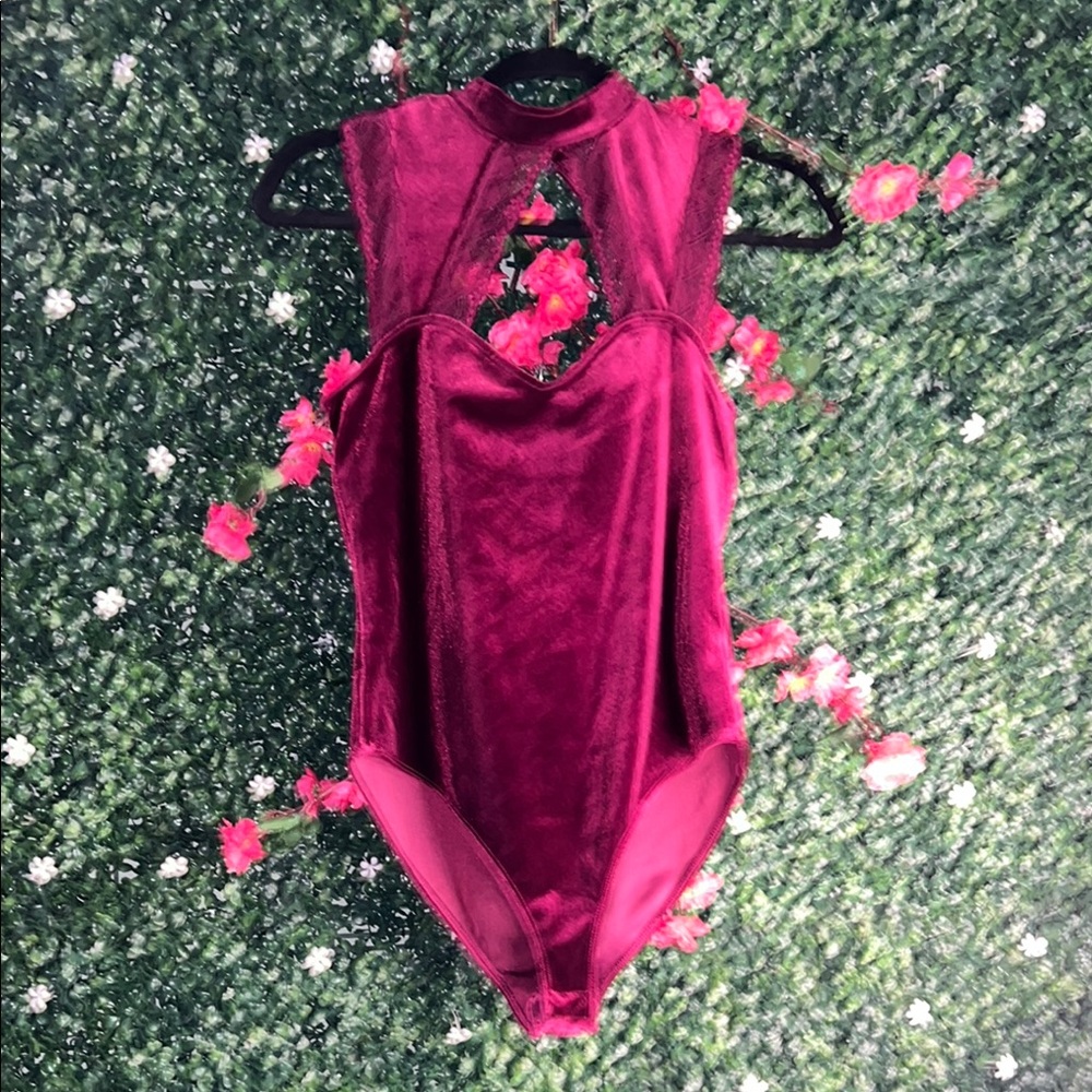 Vibrant Pink Bodysuit with Sleeveless Design and High Cut Legs